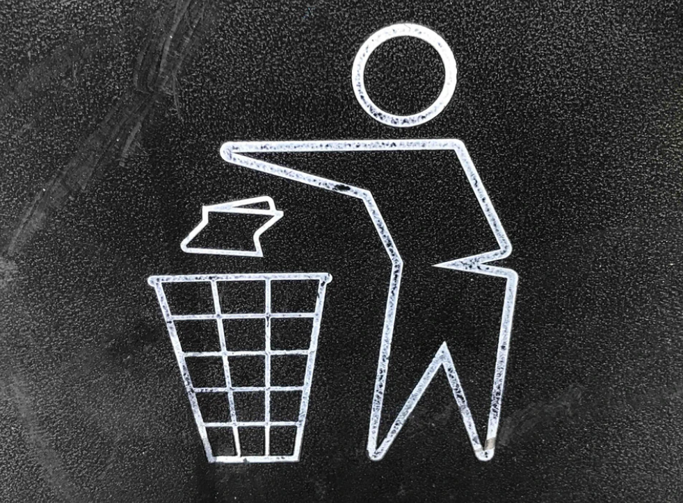 A white symbol of a person throwing a trash can Description automatically generated